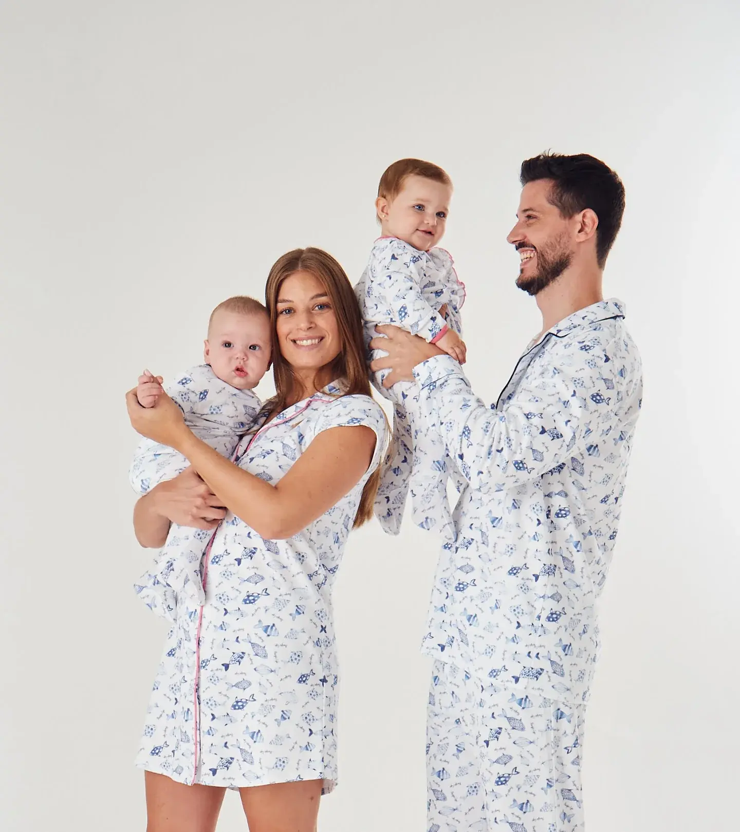 Family wearing Love Time coordinated pajamas