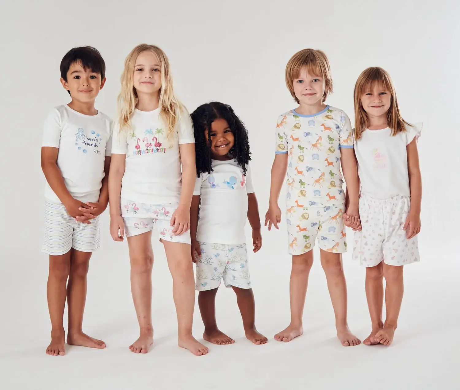 Family wearing Love Time coordinated pajamas